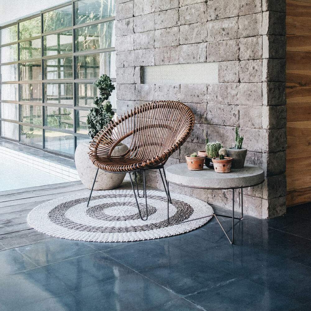 A welcoming seating area beside a sunlit window